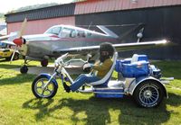 N2772V @ OH36 - Art Moose - his trike and Bonanza. He's bordering on having too much fun. - by Bob Simmermon