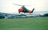 XT769 @ EGHE - XT769, CU823 Wessex 5 of 771 Sqn Royal Navy arriving at the Air Show, St Mary's Isles of Scilly September 1987 - by Pete Hughes