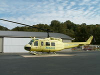 N71KP @ KBFI - Bell UH-1H/Boeing Field,Seattle - by Ian Woodcock