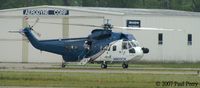 N905CH @ PVG - Helicopters taxiing, always seems like an oxymoron - by Paul Perry