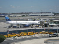 N533JB @ KJFK - This was taken from the AirTrain at JFK - by LemonLimeSoda9