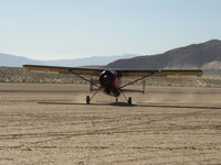 N60FG @ L90 - Broussard 214 taxi for take off at Ocotillo Wells - by FieryNature