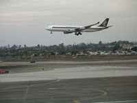 9V-SGC @ LAX - Singapore Airlines A340-541 on final approach to LAX - by Steve Nation