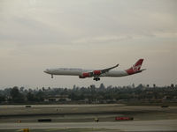 G-VRED @ LAX - Virgin A340-642 on final approach to LAX - by Steve Nation