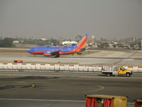 N286WN @ LAX - Southwest 737-7H4 in new colors rolling @ LAX - by Steve Nation