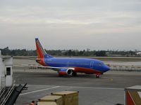 N527SW @ LAX - Southwest 737-5H4 in new colors taxying in to gate @ LAX - by Steve Nation