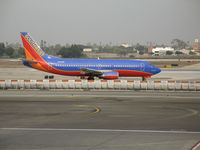 N601WN @ LAX - Southwest 737-3H4 in new colors taxying @ LAX - by Steve Nation