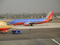 N637SW @ LAX - Southwest 737-3H4 in new colors taxying @ LAX - by Steve Nation