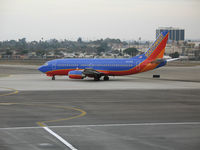 N676SW @ LAX - Southwest 737-3A4 in new colors taxying @ LAX - by Steve Nation