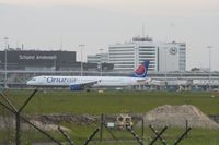 TC-OAE @ AMS - Taken on a gloomy evening at Schipol - by Steve Staunton