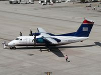 N449YV @ PHX - Pushing back - by John Meneely