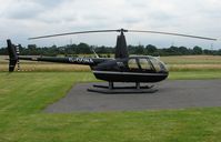 G-OONA @ EGTR - R44 II Helicopter - by Terry Fletcher