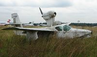 C-FQIP @ EGTR - Sad to see this deteriorating in the long grass - by Terry Fletcher