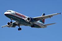 N668AW @ KLAS - America West / 2002 Airbus A320-232