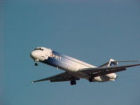N825NK @ PVD - Spirit MD80 N825NK on a short final to runway 34 at Providence on a crisp autumn day in 2004 - by Geoff Cook