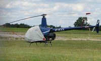 G-ICCL @ EGMC - Robinson R22 Beta - by Terry Fletcher