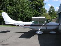 G-BNRY @ EGTB - Cessna 182 outside the hangar at Booker - by Simon Palmer