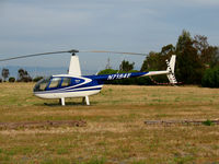 N7184E @ PAO - 2000 Robinson Helicopter R44 visiting from Watsonville @ Palo Alto, CA - by Steve Nation