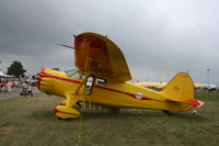 N21104 @ KOSH - Stinson SR-10J - by Mark Pasqualino