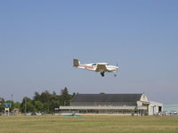 N212SM @ KFCM - Landing Runway 18 VFR from La Crosse, WI (LSE). - by Mitch Sando