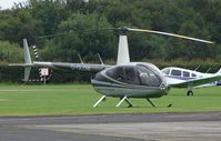 G-OLOW @ EGCB - R44