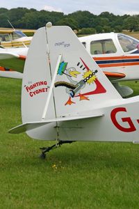 G-BXCA @ EGHP - Showing the art-work on the Hapi Cygnet - by Clive Glaister