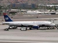 N631AW @ PHX - At the gate - by John Meneely