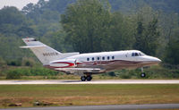 N800EM @ PDK - Taking off from Runway 20L - by Michael Martin