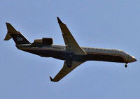 N458AW @ AVP - New Canadair regional jet gleams in the Pennsylvania sunshine. - by Daniel L. Berek