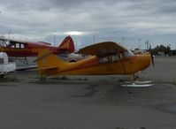 N4553E @ Z41 - 1949 Aeronca 11CC SUPER CHIEF, Continental C85 85 Hp, balanced elevators on the 11CC side by side seating model, on SKIS, Note: substantial rudder gust lock - by Doug Robertson