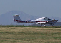 N104CL @ KAPA - Taxi to runway, with Pikes Peak in the background. - by Bluedharma