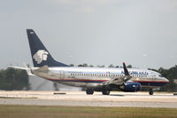 EI-DMY @ KMCO - Shimmering in the heat at Orlando, waiting for clearance to take off. - by Steve Hambleton
