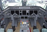 N556JT @ KAPA - Flight Deck of Legacy 600 - by John Little