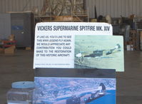 N749DP @ CMA - 1983 Vickers/Supermarine SPITFIRE Mark XIVe, Rolls Royce Griffon 65 V-12, 2,050 Hp, in restoration, info card - by Doug Robertson