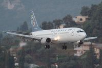 SX-BKF @ LGKR - Olympic 737-400 - by Andy Graf-VAP