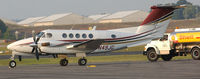 N49JG @ DAN - 1981 Beech B200 in Danville Va. about to be refueled as Guy pulls the truck around. - by Richard T Davis