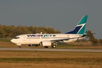 C-GWAZ @ YKF - Taixing on to runway 25, Flight to Calgary From Waterloo Onatrio Canada - by Shawn Hathaway