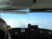 N8153L - Don at the controls somewhere over Kentucky at 8000' - by Bob Simmermon
