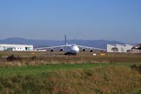 UR-82029 @ LFSB - on the left side swiss hangar - right side new Novartis hangar - by eap_spotter