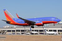 N228WN @ SNA - Southwest Airlines N228WN (FLT SWA1057) from Chicago Midway (KMDW) landing RWY 19R. - by Dean Heald