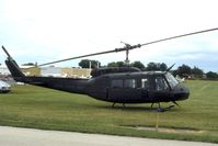 66-16006 @ DPA - UH-1H passing through.  Was a Vietnam combat vet.  Now mounted at YIP - by Glenn E. Chatfield