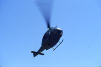 66-16341 @ ARR - UH-1H 66-16341 flying over the airport during an open house - by Glenn E. Chatfield