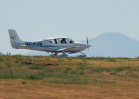 N298AM @ KAPA - Taxi for takeoff with Pike's Peak in the background - by Bluedharma