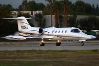 N20HJ @ VNY - Sky Wide Ventures LLC Learjet 35A starting takeoff roll on RWY 16R enroute to Phoenix Sky Harbor Int'l (KPHX). - by Dean Heald