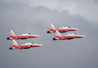 J-3081 @ AXALP - After their demonstration four Patrouille Tigers made one final pass along the Axalphorn. Although photographed from the mountain peak the cloud cover in the Haslital makes this a virtual air to air picture. - by Joop de Groot