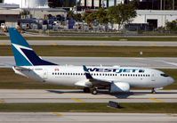 C-GWBN @ KFLL - Westjet B737 -One of the few daily 'foreign' visitors - by Terry Fletcher