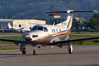 N719PC @ VNY - Orchids Leasing LLC 2006 Pilatus PC-12/47 N719PC taxiing to RWY 16R for departure. - by Dean Heald