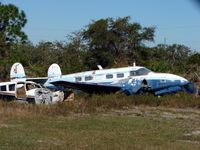 N136L @ X26 - Unable to get an angle that would show the registration serial of this wreck - by Terry Fletcher