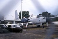 131485 - AP-2E shot through a chain link fence at the Army Aviation Museum - by Glenn E. Chatfield