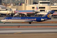 N903ME @ LAX - Midwest Express N903ME (FLT MEP206) from Kansas City Int'l (KMCI) holding short of RWY 25R after arrival on RWY 25L.